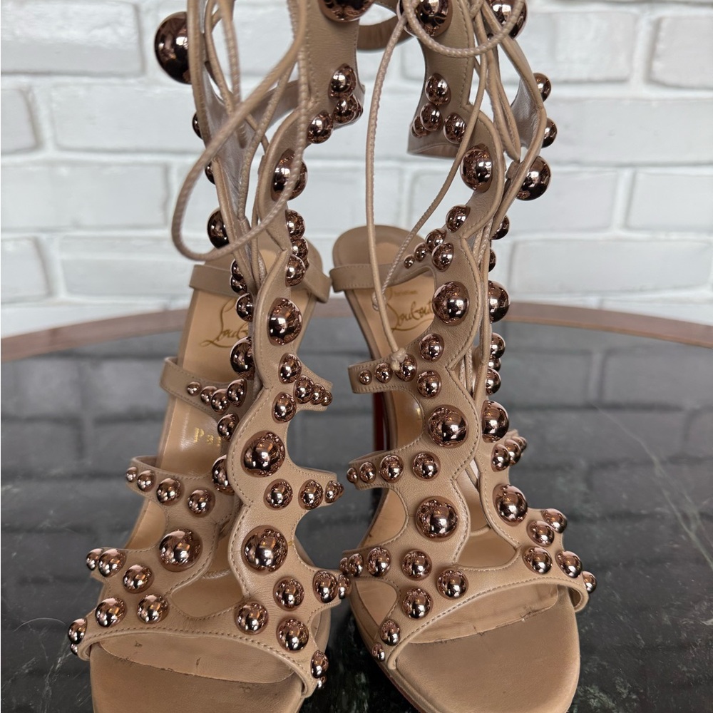 Christian Louboutin ROSE GOLD Studs on nude Leather Gladiator